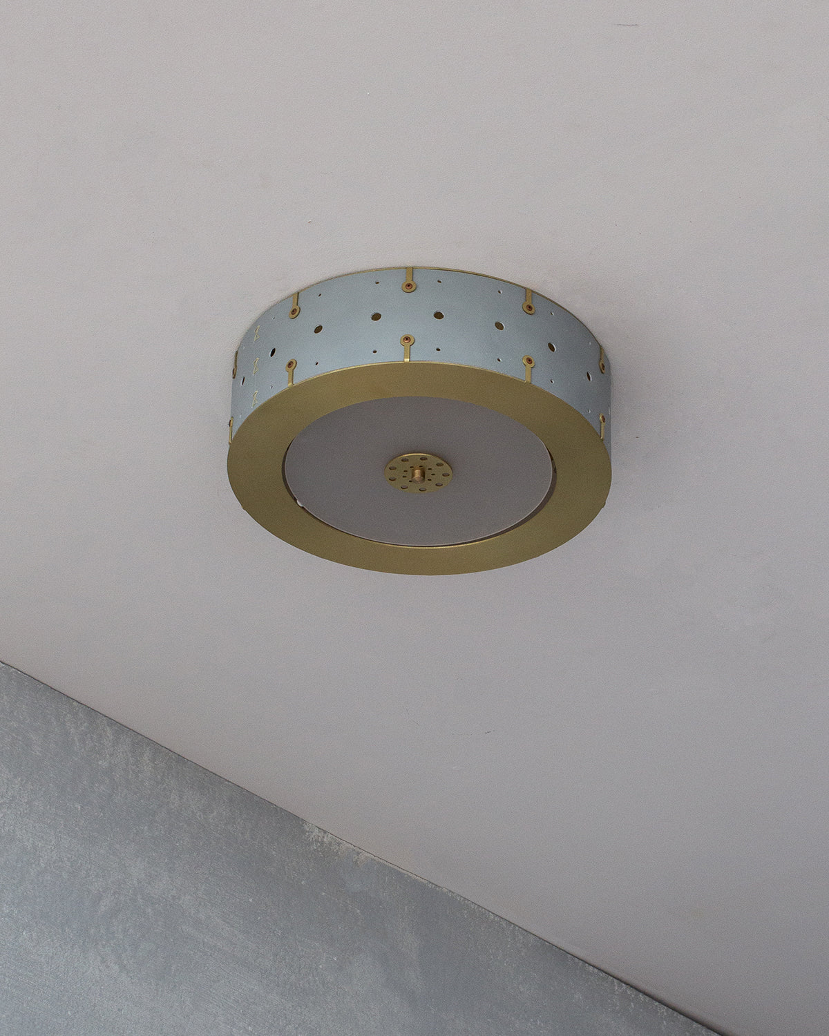 Beautiful satin brass flush mount ceiling fixture with handstitched leather drum shade