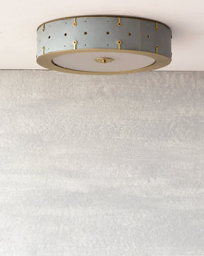 Beautiful satin brass flush mount ceiling fixture with handstitched leather drum shade