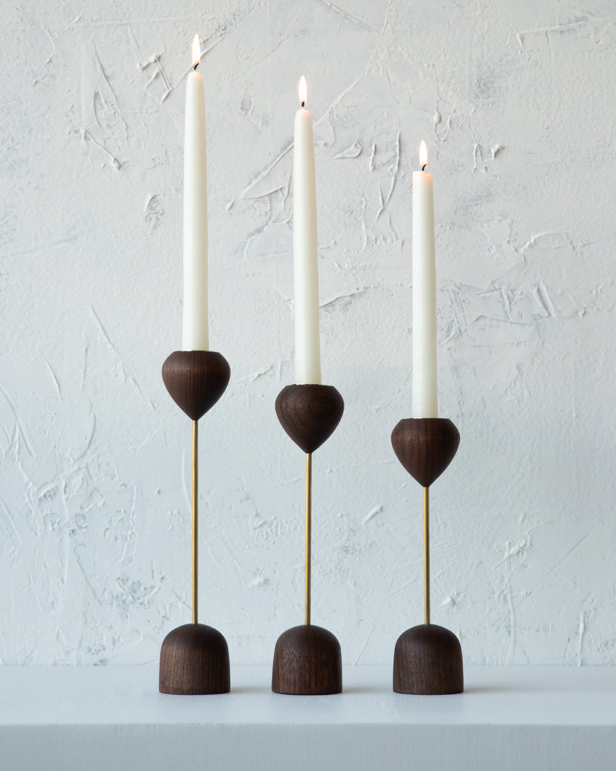 Modern black walnut and brass flower inspired candle holder