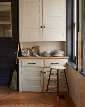 LOSTINE WHITEWASH GORDON STOOL - IRON BASE  in kitchen utility corner, household essentials- Classic ladder metal base stool with wooden seat and feet, workshop stool. Counter and bar height. Made by Lostine in Philadelphia. Simple interior design, made in the USA. Warm American Modern Design